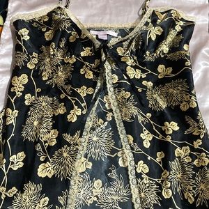 Gold and black print very pretty has lace trim